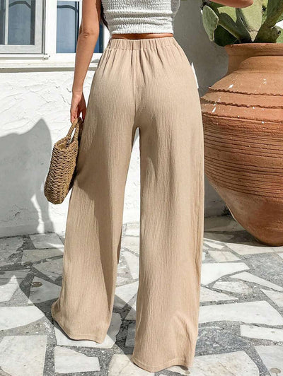 Stilrena byxor med asymmetrisk midja