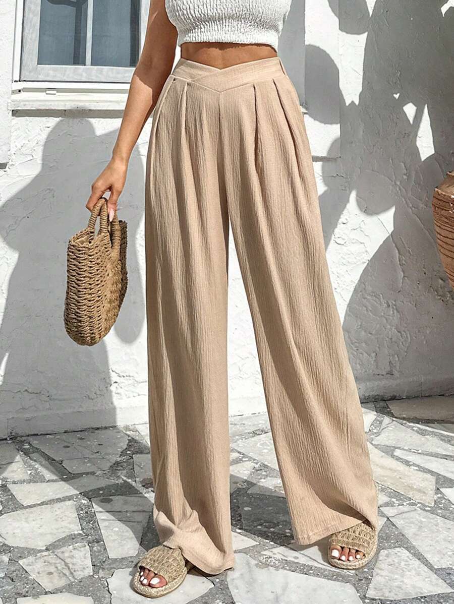 Stilrena byxor med asymmetrisk midja