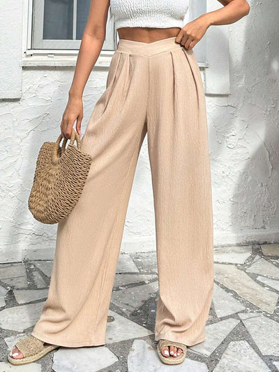 Stilrena byxor med asymmetrisk midja