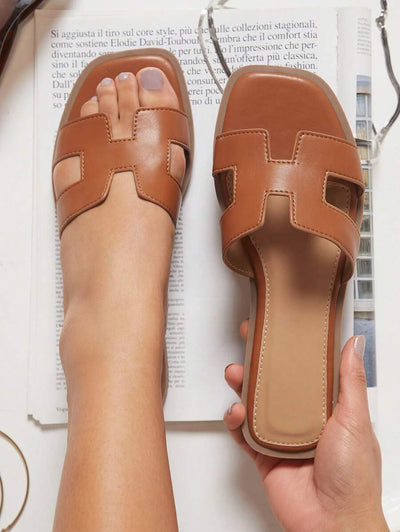 Luxe-inspirerade vita slides med sele