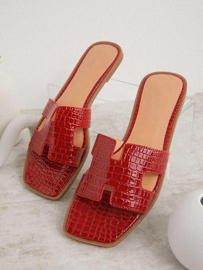 Luxe-inspirerade vita slides med sele