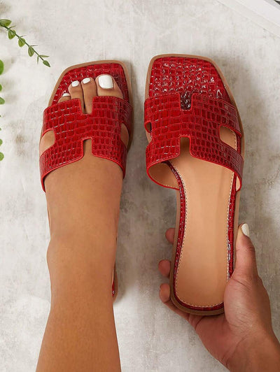 Luxe-inspirerade vita slides med sele