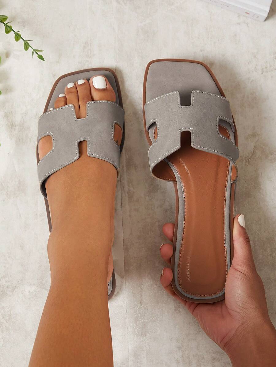 Luxe-inspirerade vita slides med sele