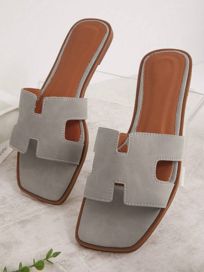 Luxe-inspirerade vita slides med sele