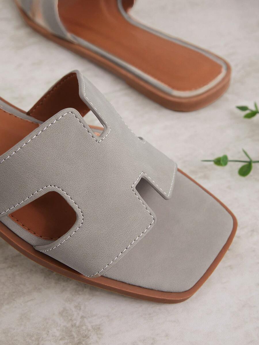 Luxe-inspirerade vita slides med sele