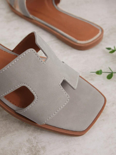 Luxe-inspirerade vita slides med sele