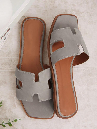 Luxe-inspirerade vita slides med sele