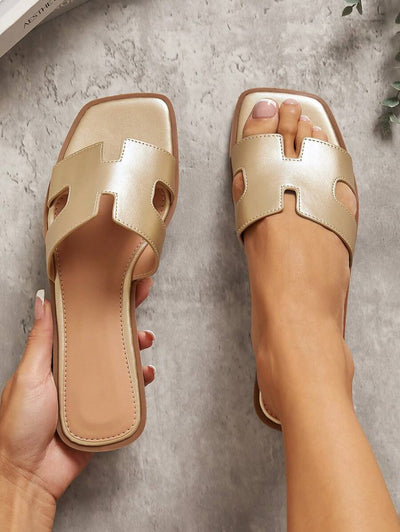 Luxe-inspirerade vita slides med sele