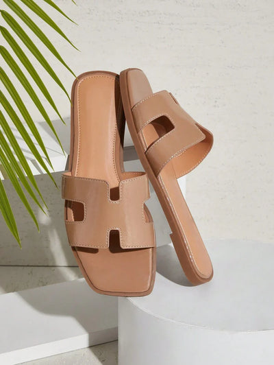 Luxe-inspirerade vita slides med sele