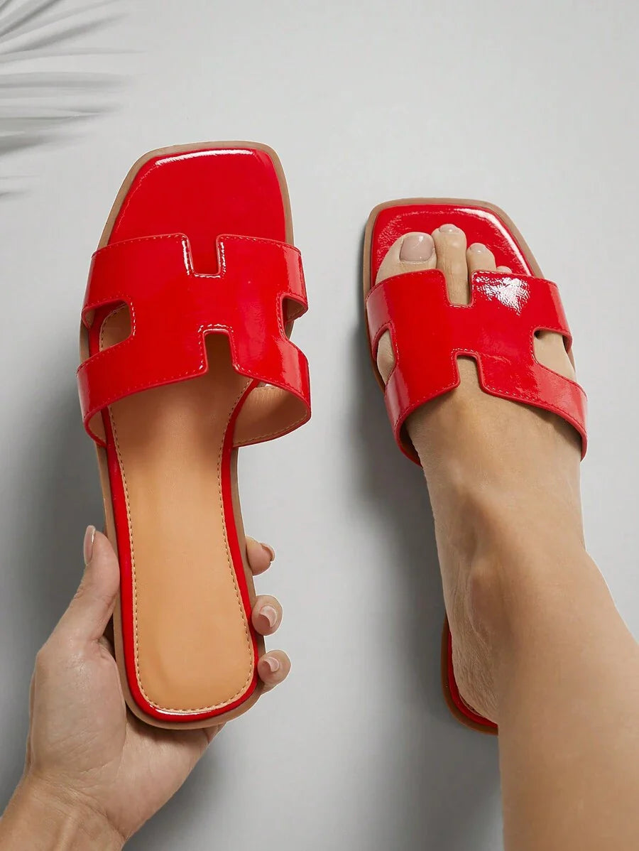 Luxe-inspirerade vita slides med sele