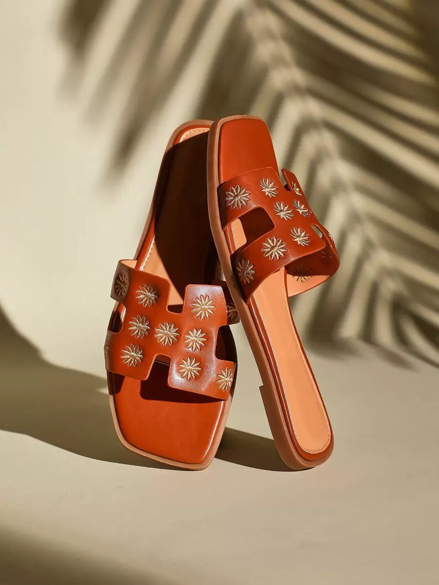 Luxe-inspirerade vita slides med sele