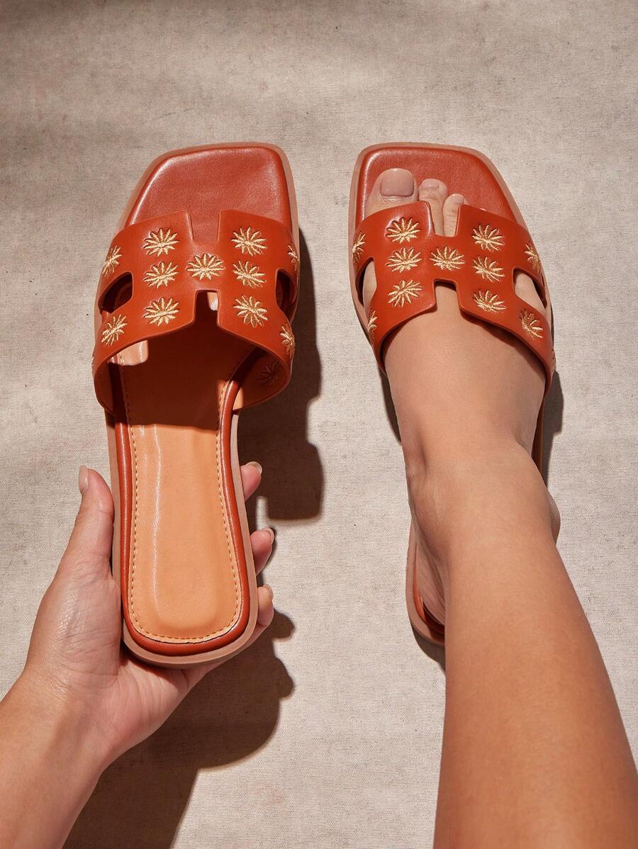 Luxe-inspirerade vita slides med sele