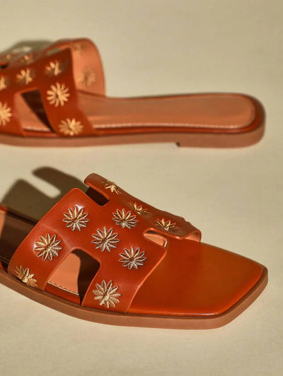 Luxe-inspirerade vita slides med sele