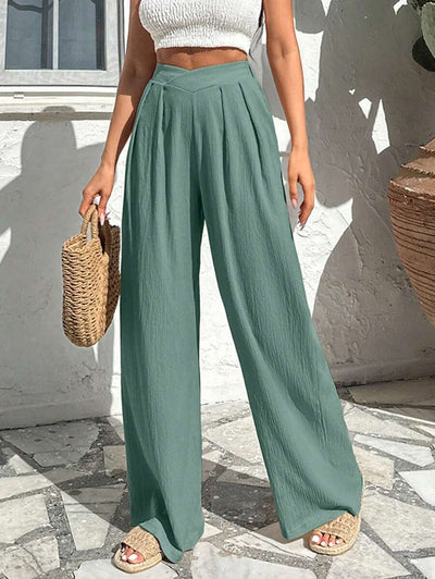 Stilrena byxor med asymmetrisk midja