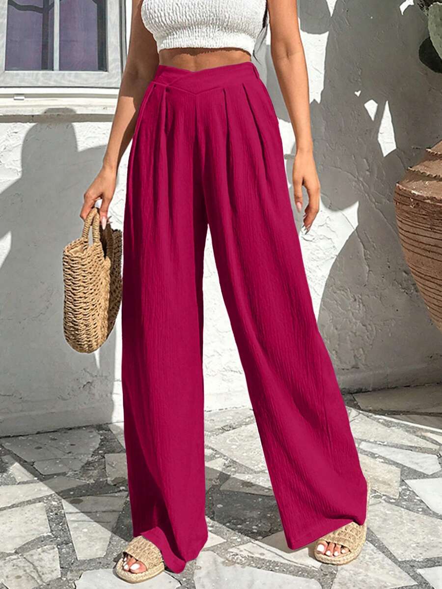 Stilrena byxor med asymmetrisk midja