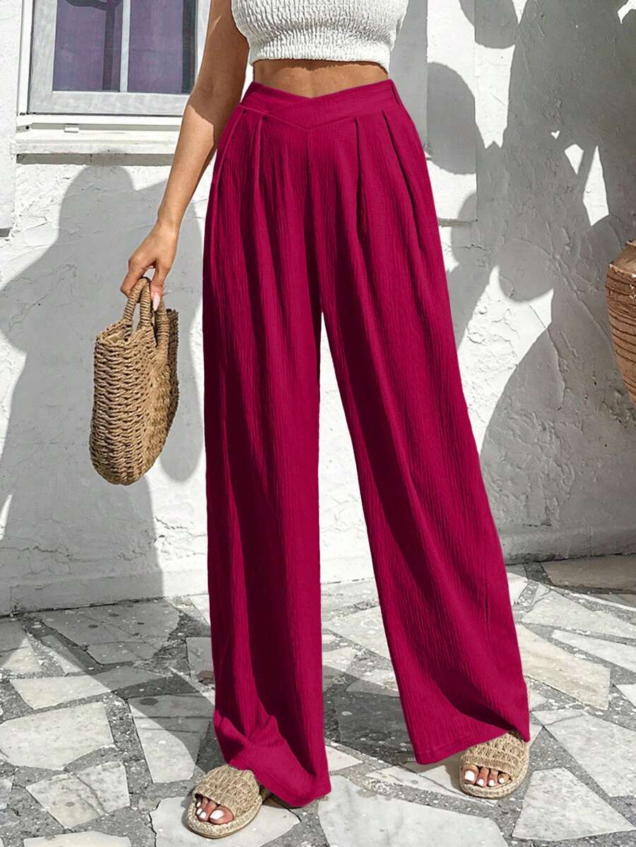 Stilrena byxor med asymmetrisk midja