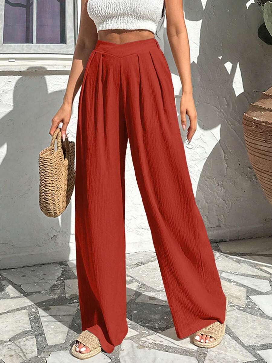 Stilrena byxor med asymmetrisk midja