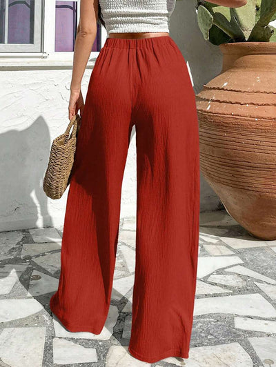 Stilrena byxor med asymmetrisk midja