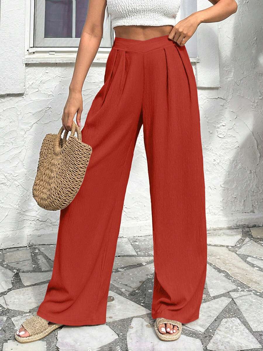 Stilrena byxor med asymmetrisk midja