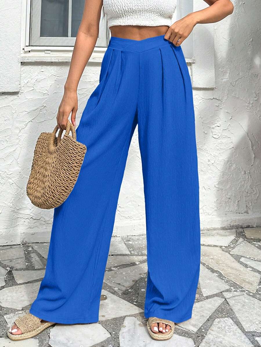 Stilrena byxor med asymmetrisk midja