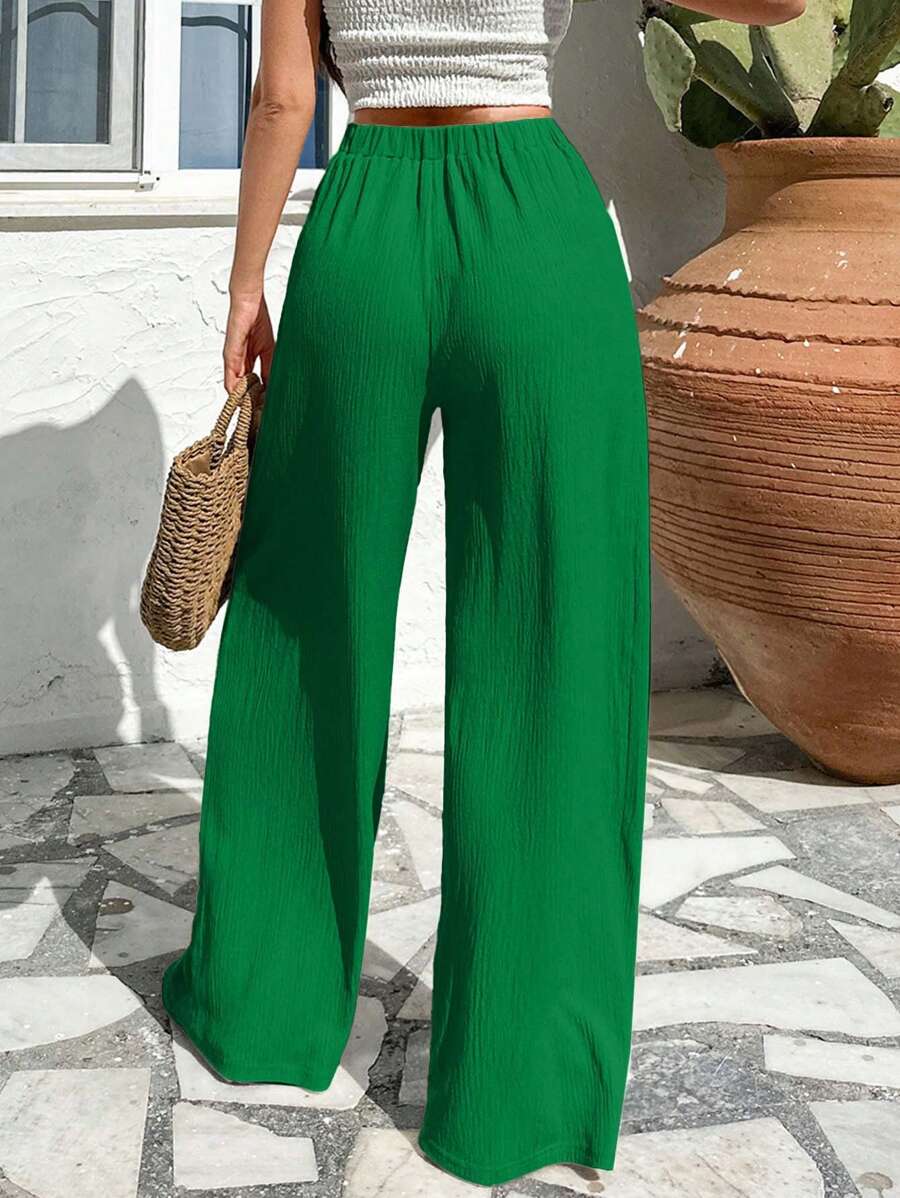 Stilrena byxor med asymmetrisk midja