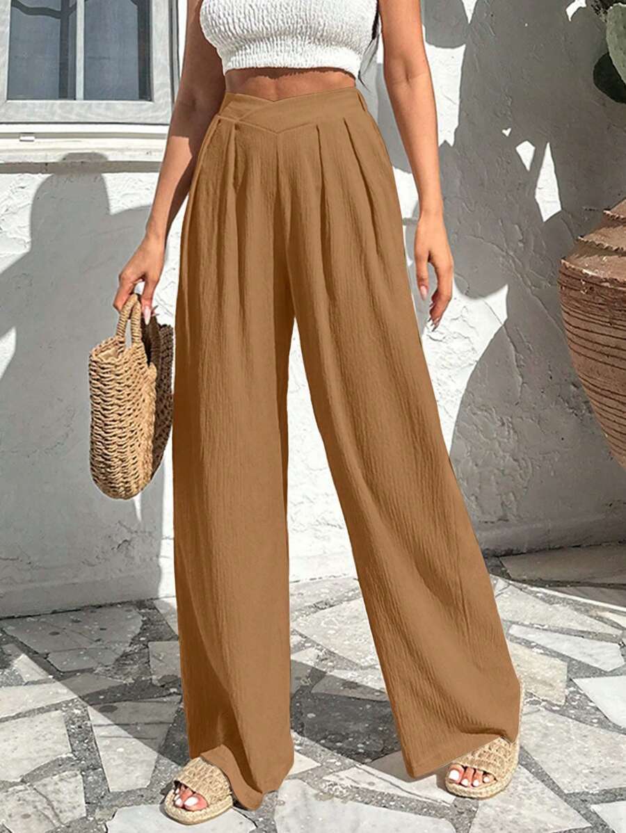 Stilrena byxor med asymmetrisk midja