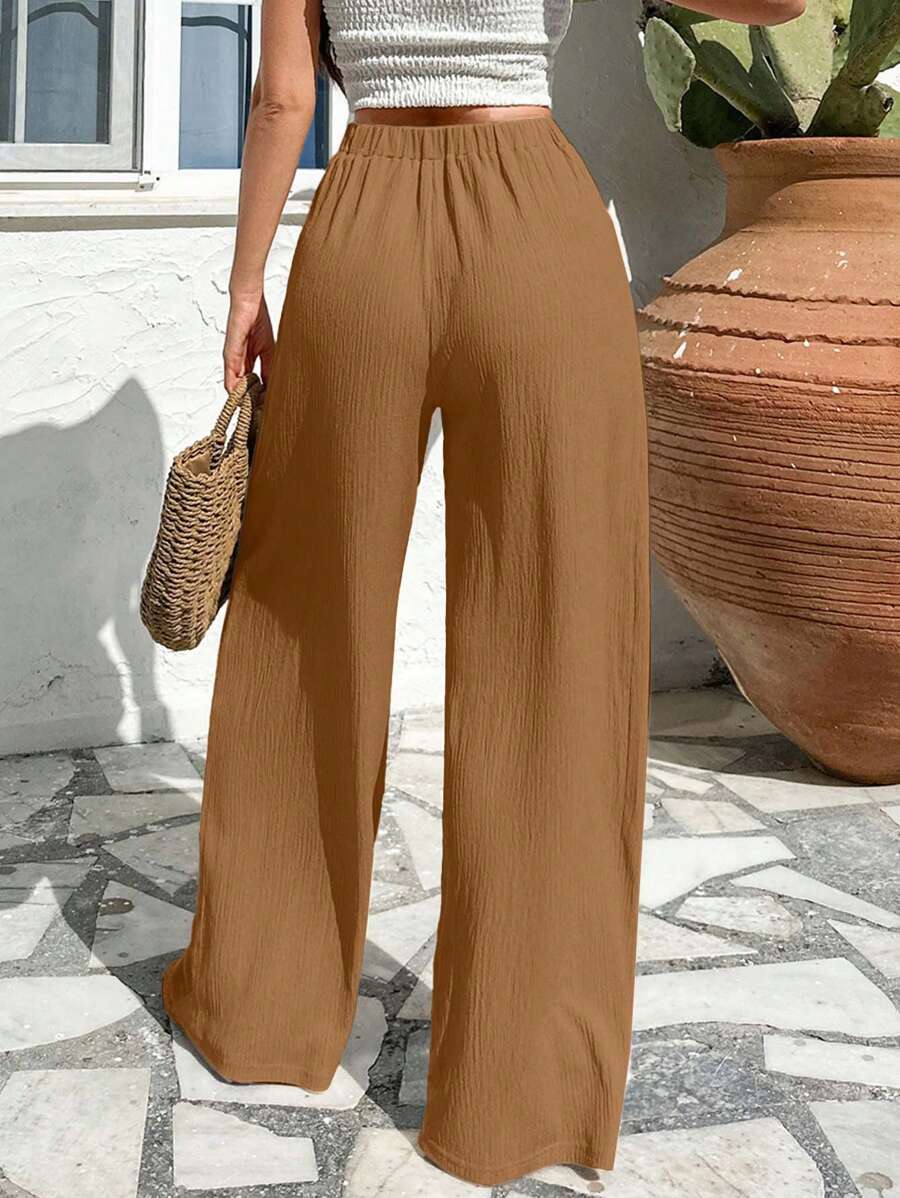 Stilrena byxor med asymmetrisk midja