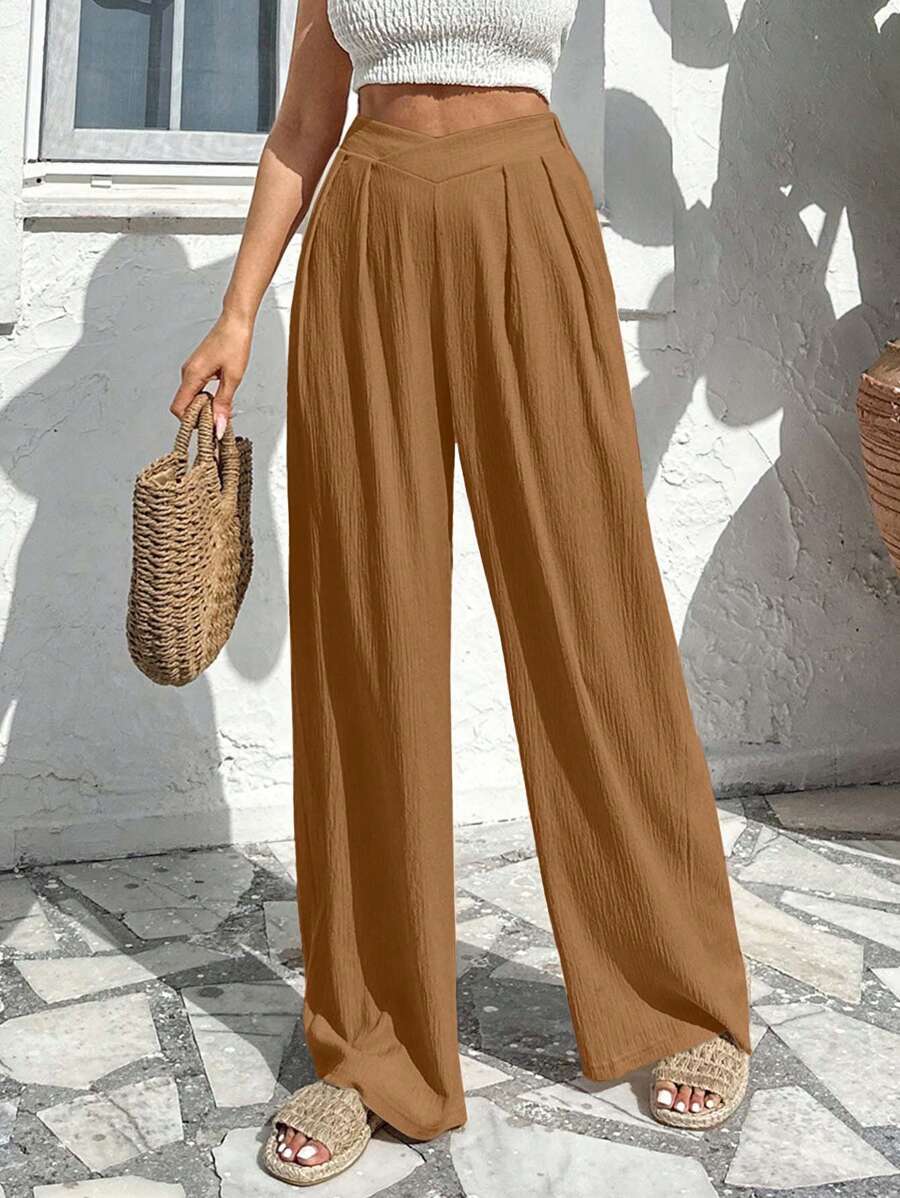 Stilrena byxor med asymmetrisk midja