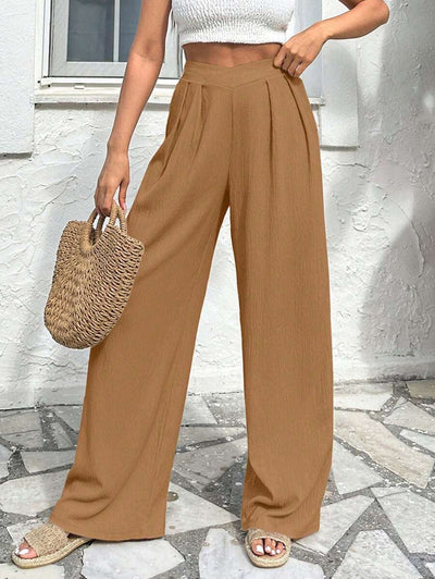 Stilrena byxor med asymmetrisk midja