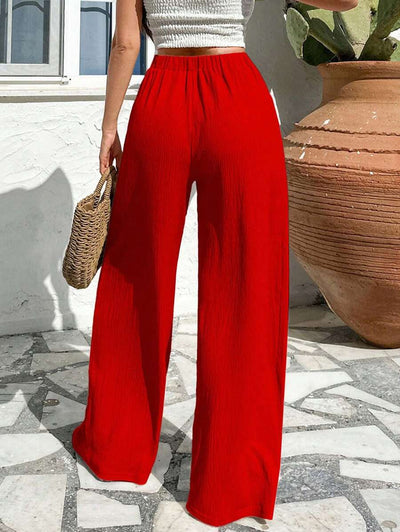 Stilrena byxor med asymmetrisk midja