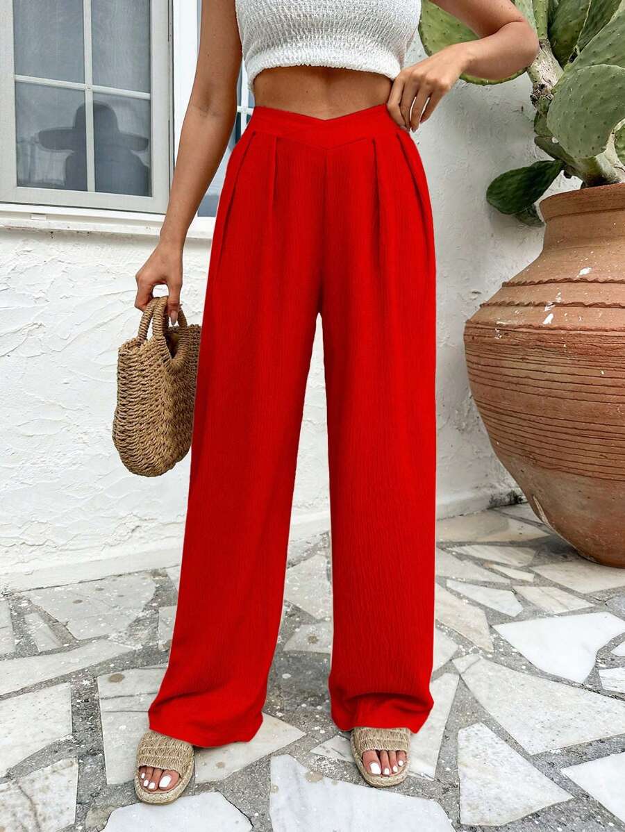 Stilrena byxor med asymmetrisk midja