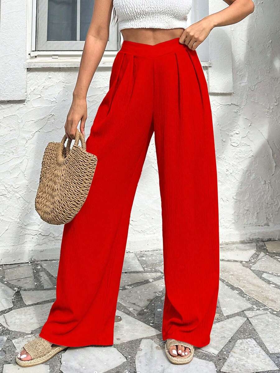 Stilrena byxor med asymmetrisk midja