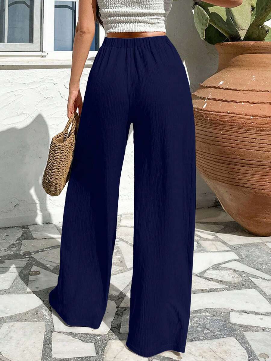 Stilrena byxor med asymmetrisk midja