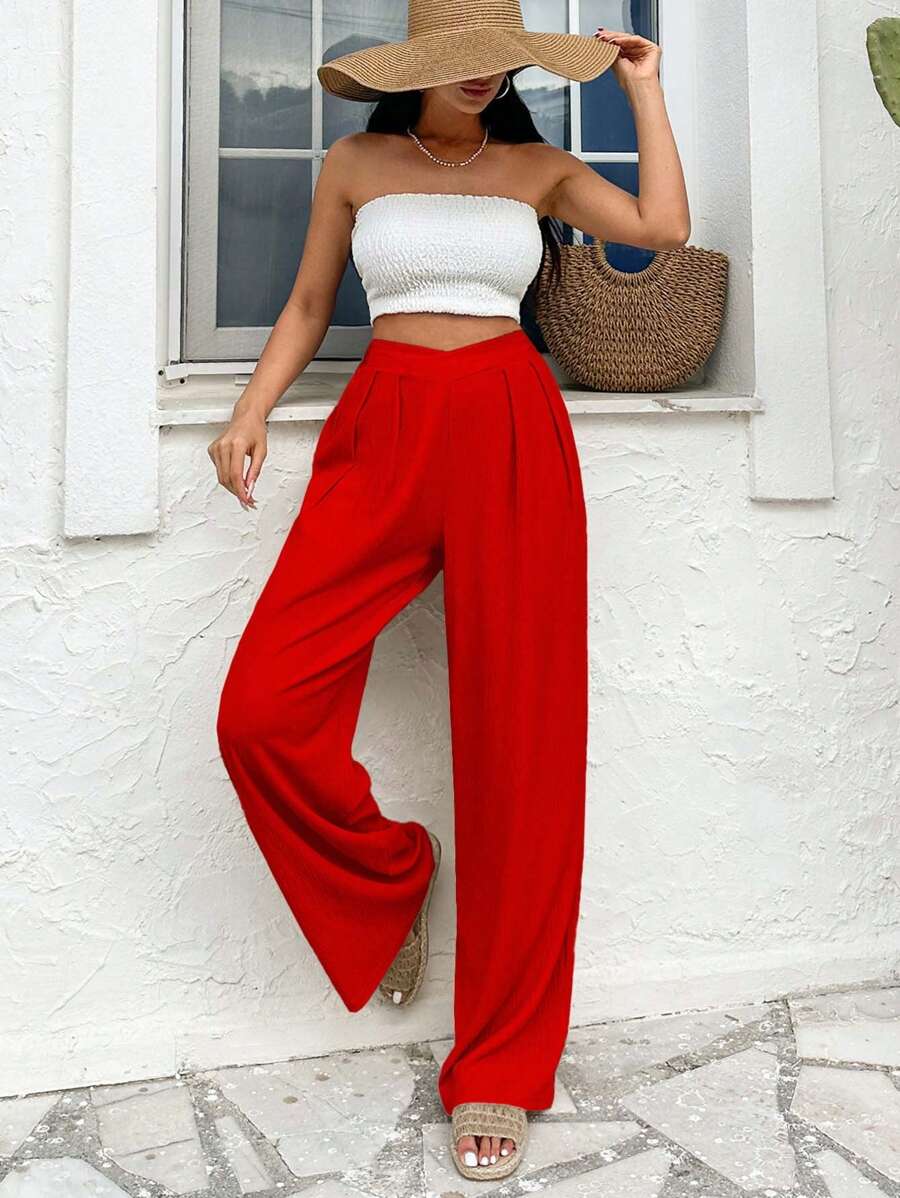 Stilrena byxor med asymmetrisk midja