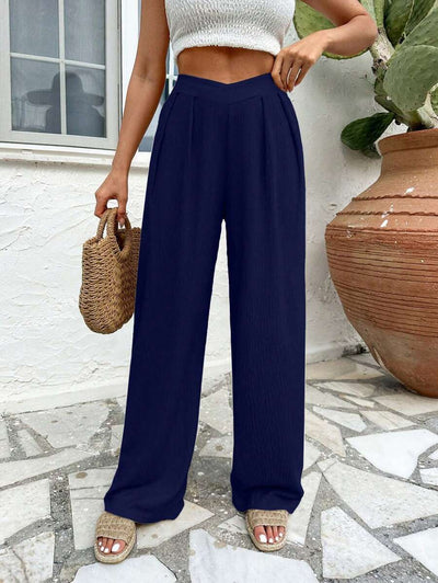 Stilrena byxor med asymmetrisk midja