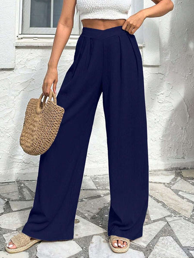 Stilrena byxor med asymmetrisk midja