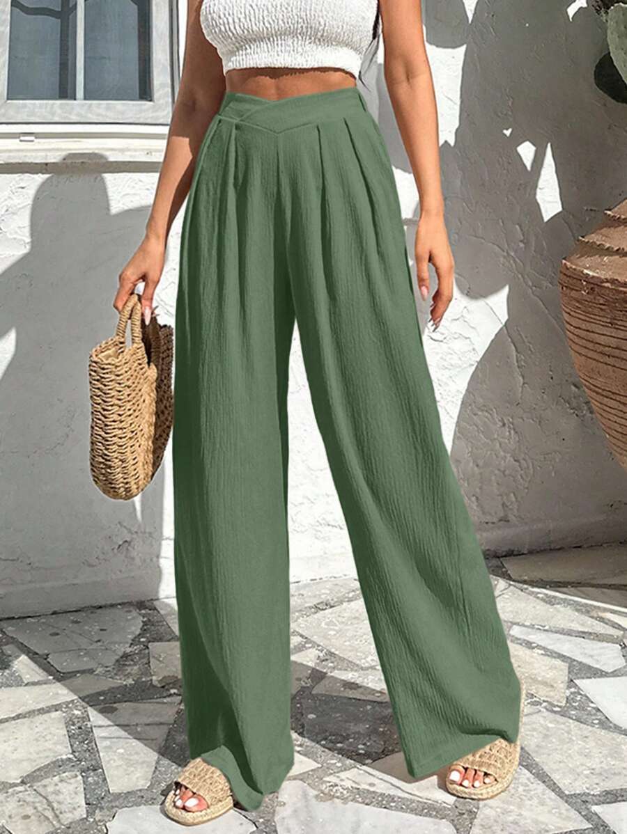 Stilrena byxor med asymmetrisk midja