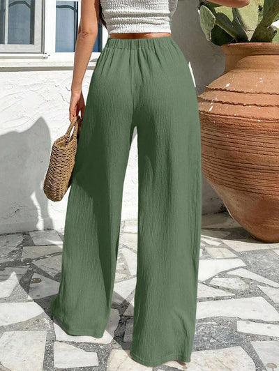 Stilrena byxor med asymmetrisk midja