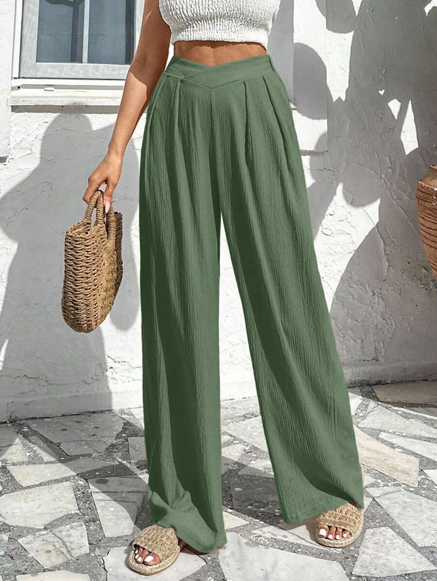 Stilrena byxor med asymmetrisk midja