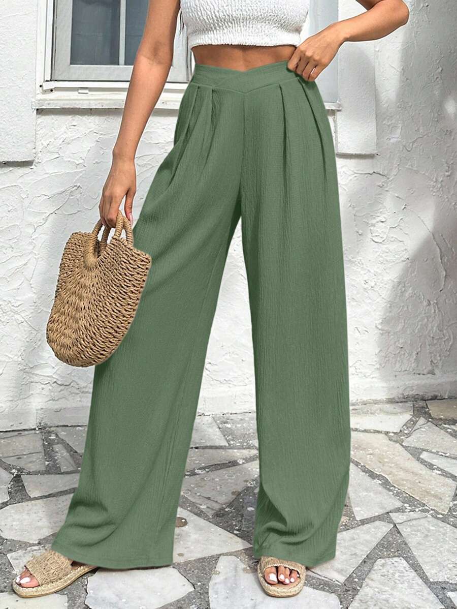 Stilrena byxor med asymmetrisk midja