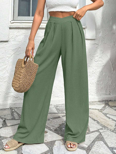 Stilrena byxor med asymmetrisk midja