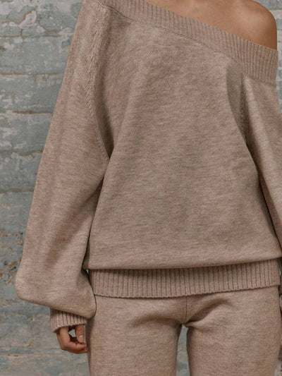 Asymmetrisk ribbstickad topp