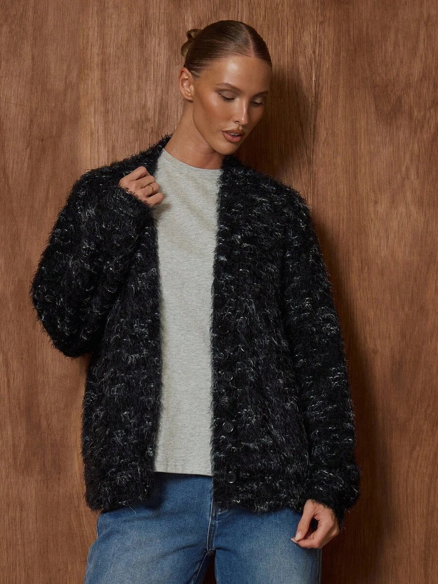 Oversized texturerad cardigan med ränder