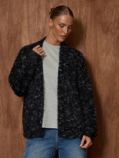 Oversized texturerad cardigan med ränder