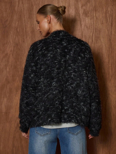 Oversized texturerad cardigan med ränder