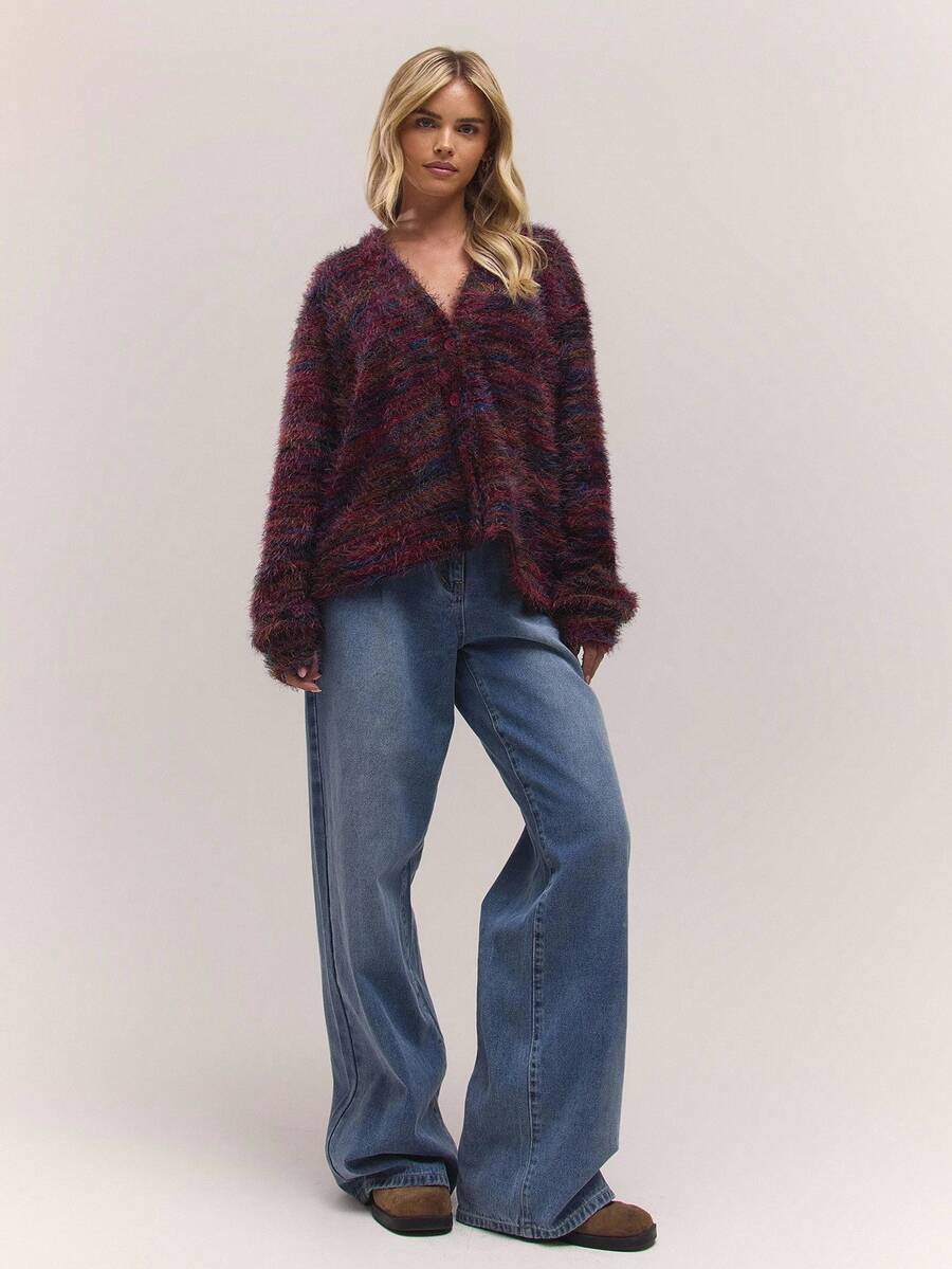 Oversized texturerad cardigan med ränder