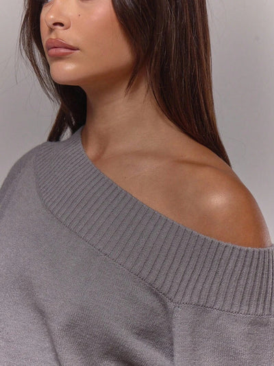 Asymmetrisk ribbstickad topp